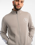 Chaqueta deportiva gris paloma